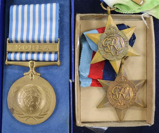 Two WWII medals and 2 Korea medals.